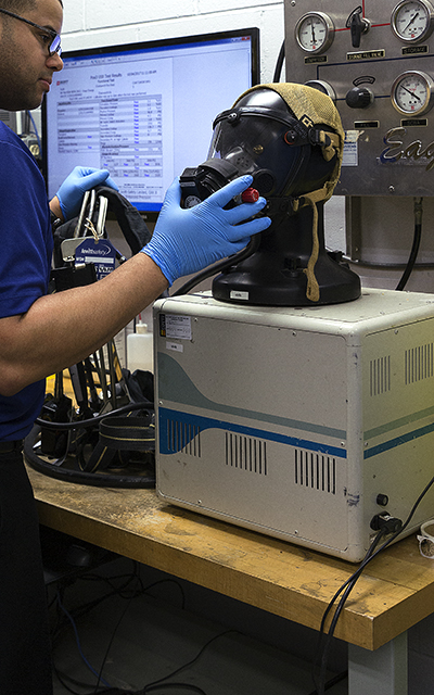 Mobile SCBA Service - SCBA mask being serviced in house after mobile service truck visited